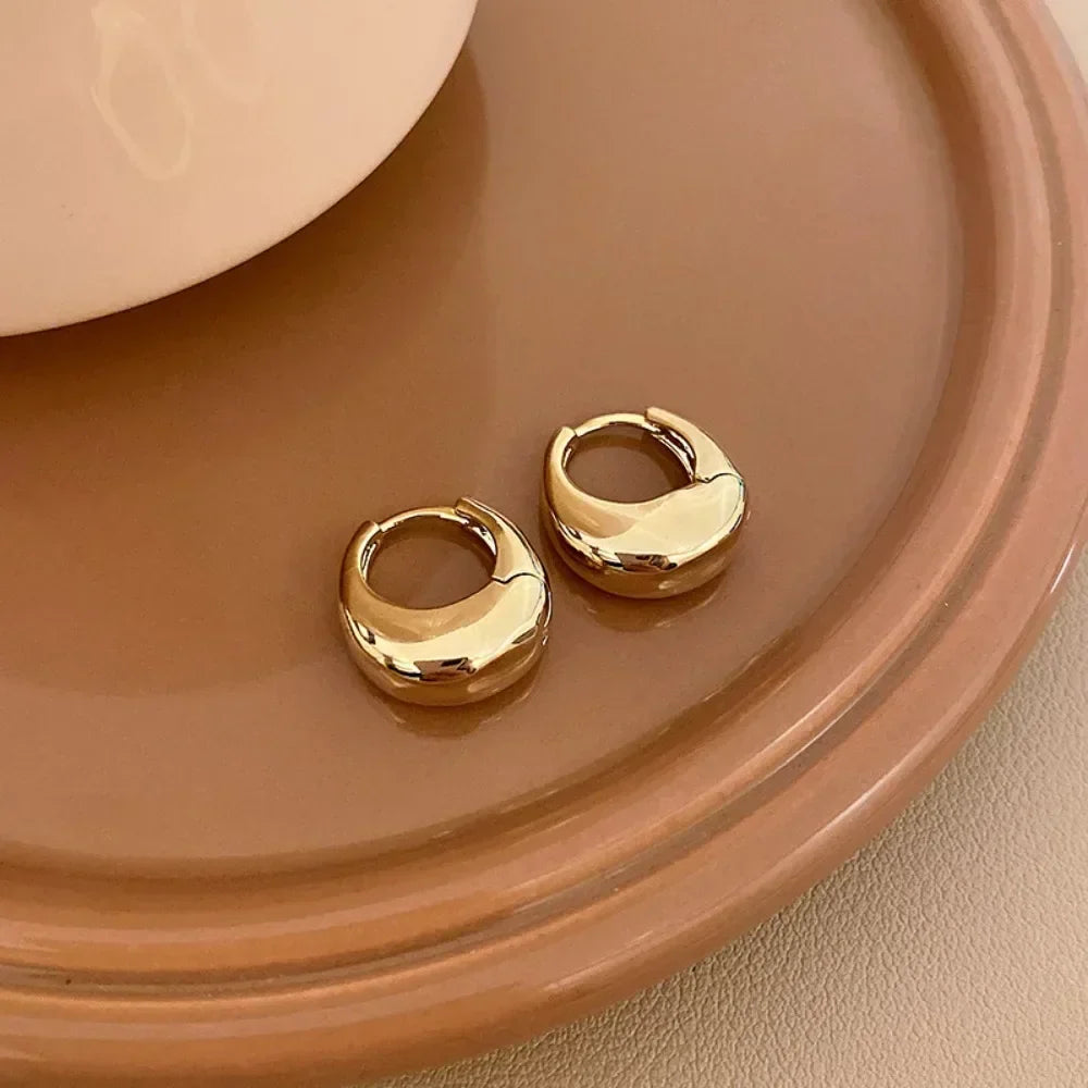 Argolas Grossas – Brilho Intenso em Aço Inoxidável