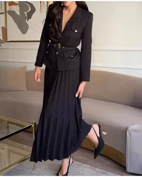 Conjunto Elegante com Casaco Alongado e Saia Plissada – Sofisticação em Dois Tempos